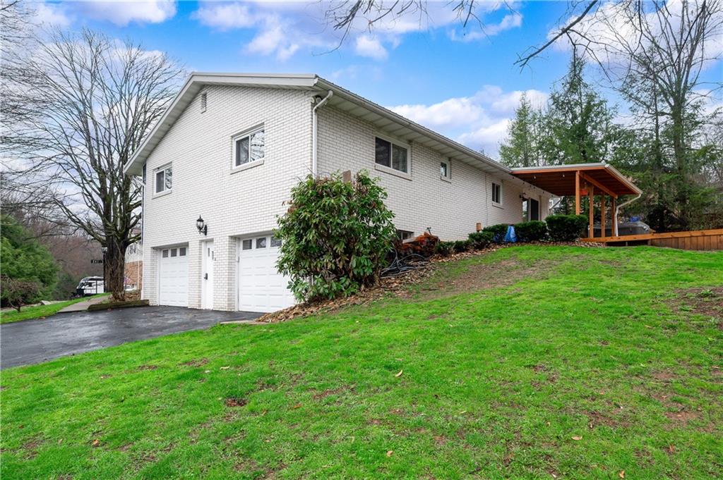 241 La Ray Drive Butler, PA 16001 - Photo 32 of 34 a front view of house with yard and trees