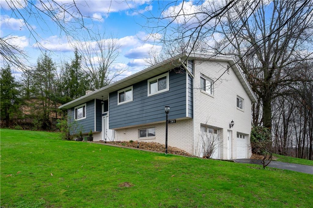 241 La Ray Drive Butler, PA 16001 - Photo 33 of 34 a front view of house with yard and green space