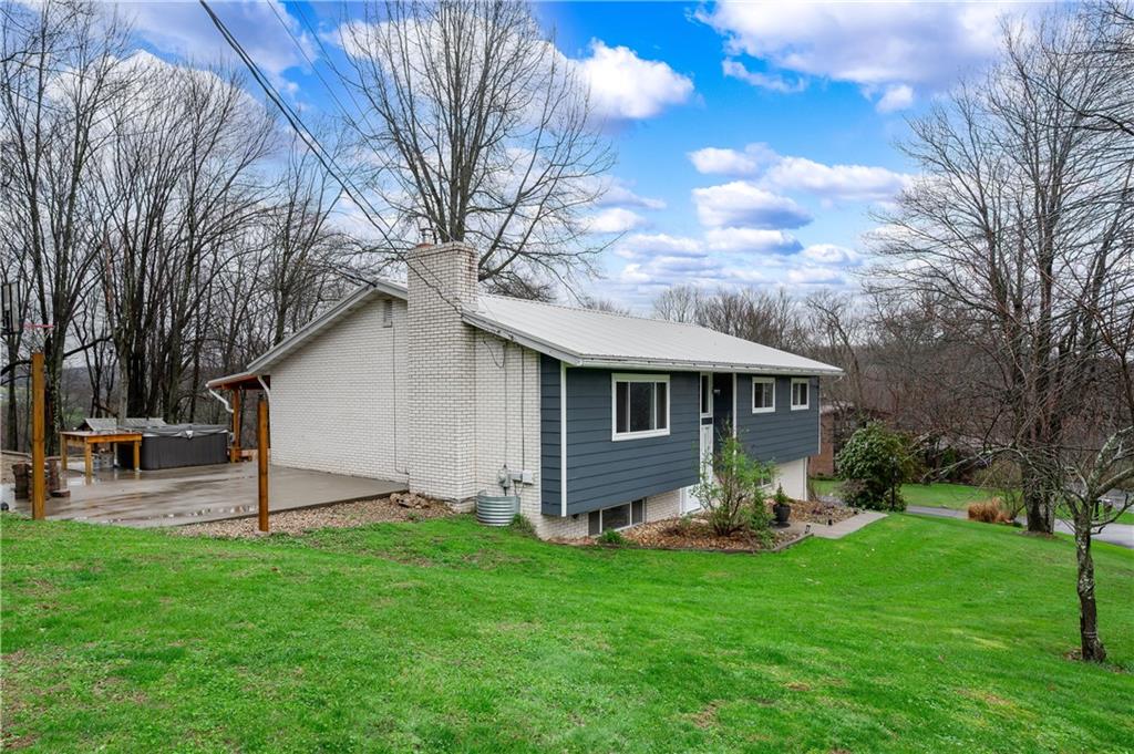 241 La Ray Drive Butler, PA 16001 - Photo 34 of 34 a view of a house with backyard and a tree