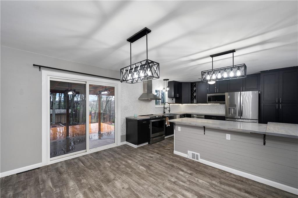 241 La Ray Drive Butler, PA 16001 - Photo 8 of 34 a large kitchen with a sink and refrigerator