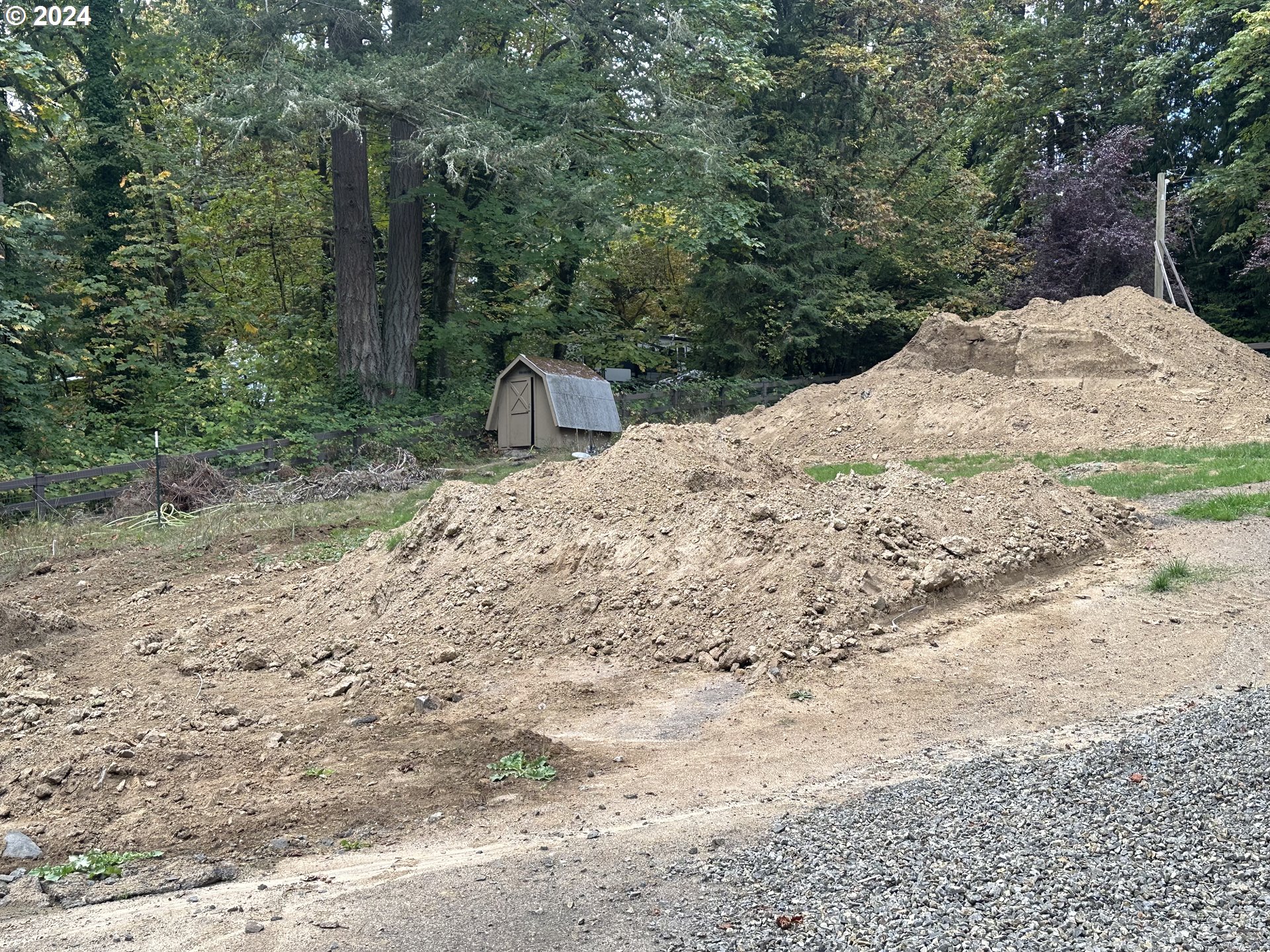 18700 Northwest Logie Trail Road Portland, OR 97231 - Photo 10 of 14 a view of a backyard of a house