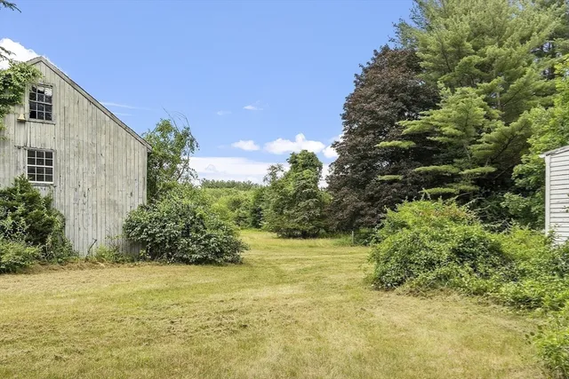 a view of a yard with an outdoor space