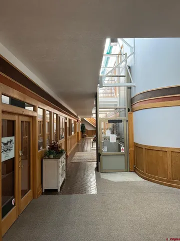 a view of a building with a parking space