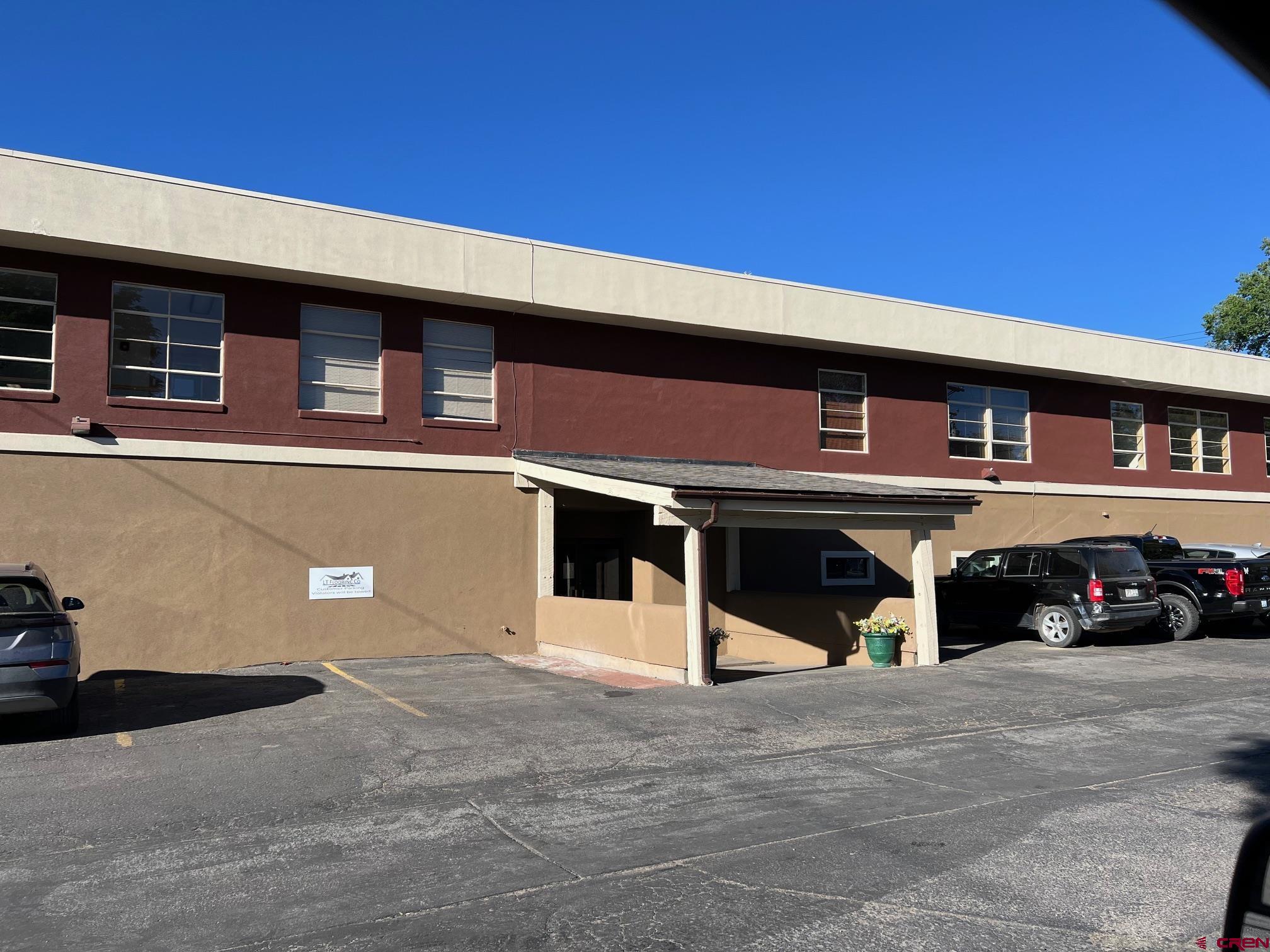 1911 North Main Avenue, Unit 116 Durango, CO 81301 - Photo 5 of 10 a black car parked in front of a building