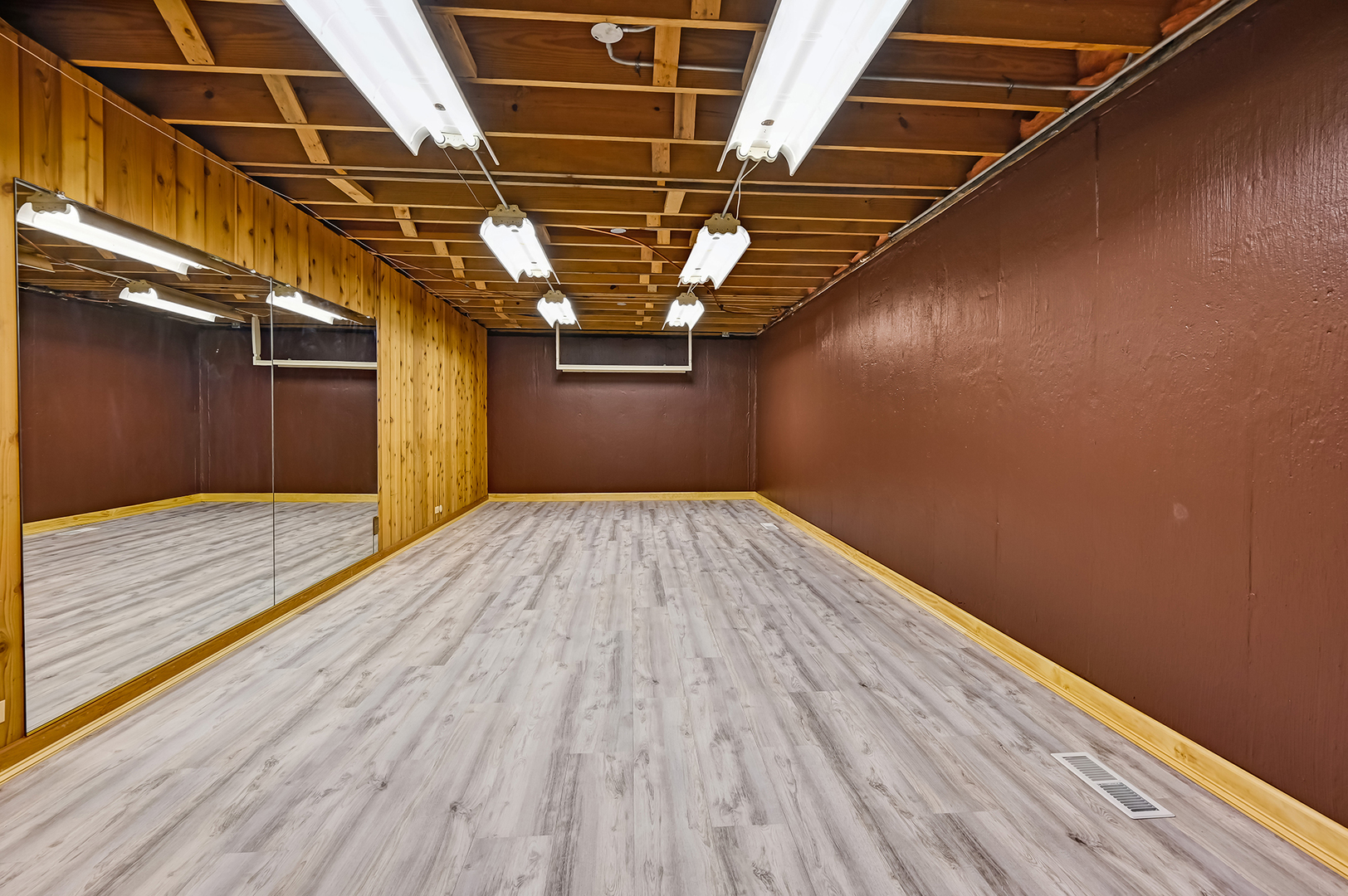 8857 Johnston Road Burr Ridge, IL 60527 - Photo 35 of 47 a view of a room with wooden floor
