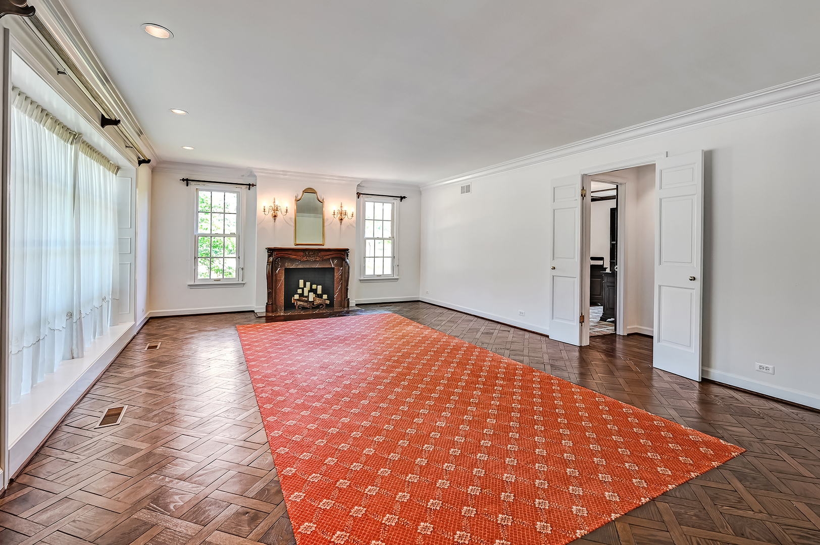 8857 Johnston Road Burr Ridge, IL 60527 - Photo 9 of 47 an empty room with fireplace wooden floor and windows