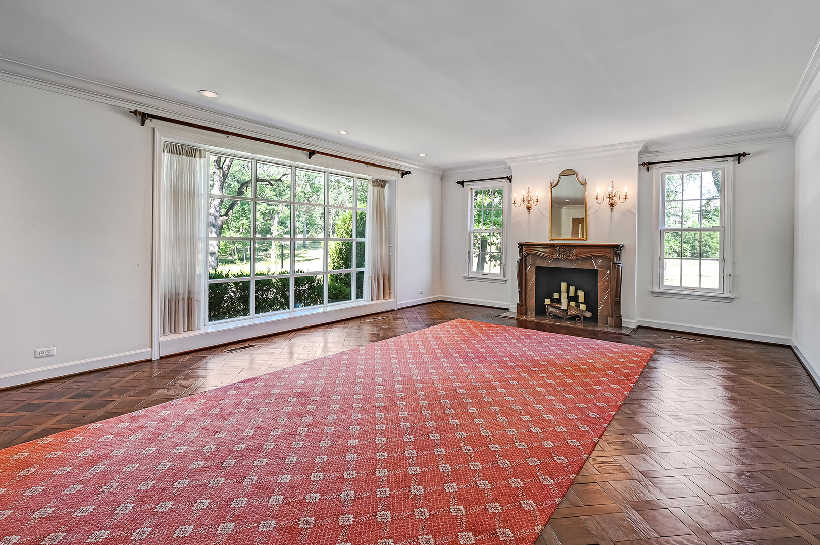 8857 Johnston Road Burr Ridge, IL 60527 - Photo 10 of 47 a view of empty room with wooden floor fireplace and windows