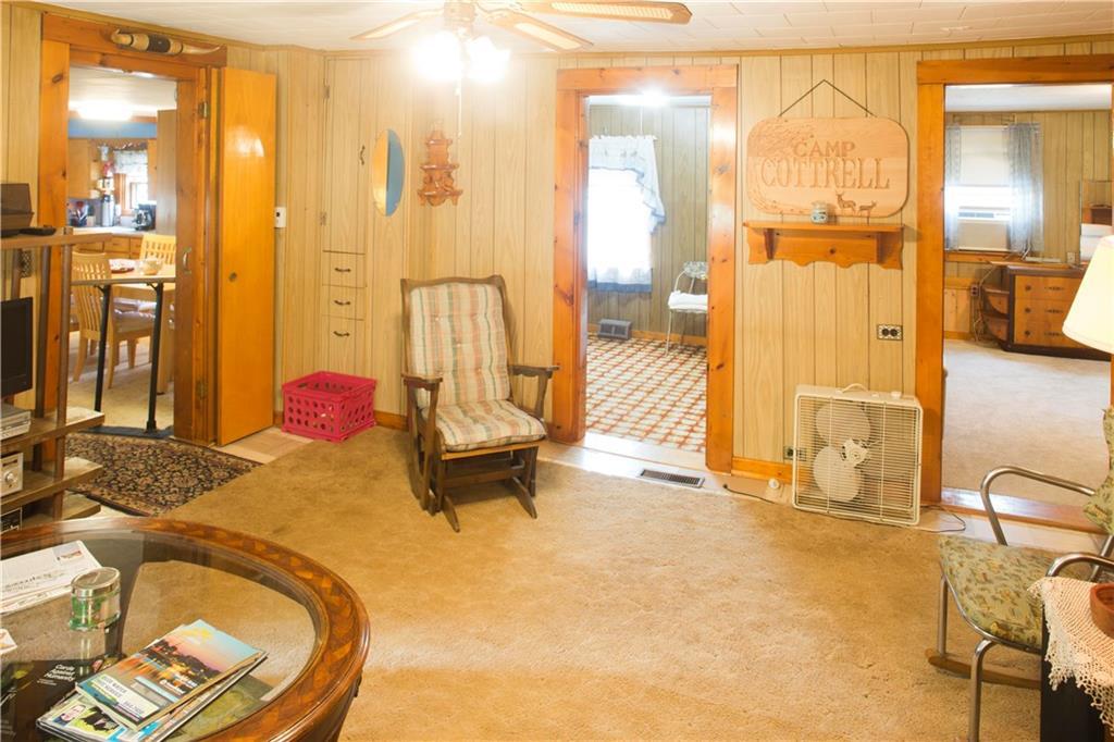 196 Cottrell Road Dixmont, ME 04932 - Photo 16 of 35 Two bedrooms are off the living room