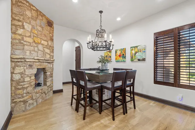a dining room with furniture and window