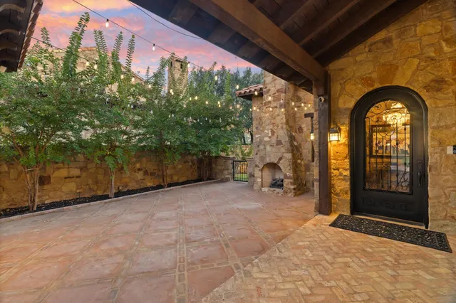 a view of a door of a house with outdoor space
