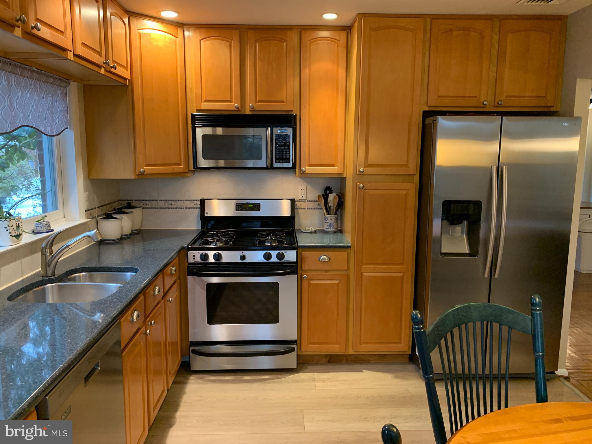 147 Harned Road Springfield, PA 19064 - Photo 15 of 56 Ample Eat In Kitchen with stainless appliances