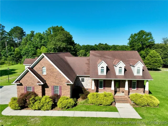 front view of house with a yard