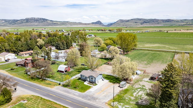365 South Center Street Fielding, UT 84311 - Photo 4 of 41 Aerial view of sparsely populated area featuring a mountain backdrop