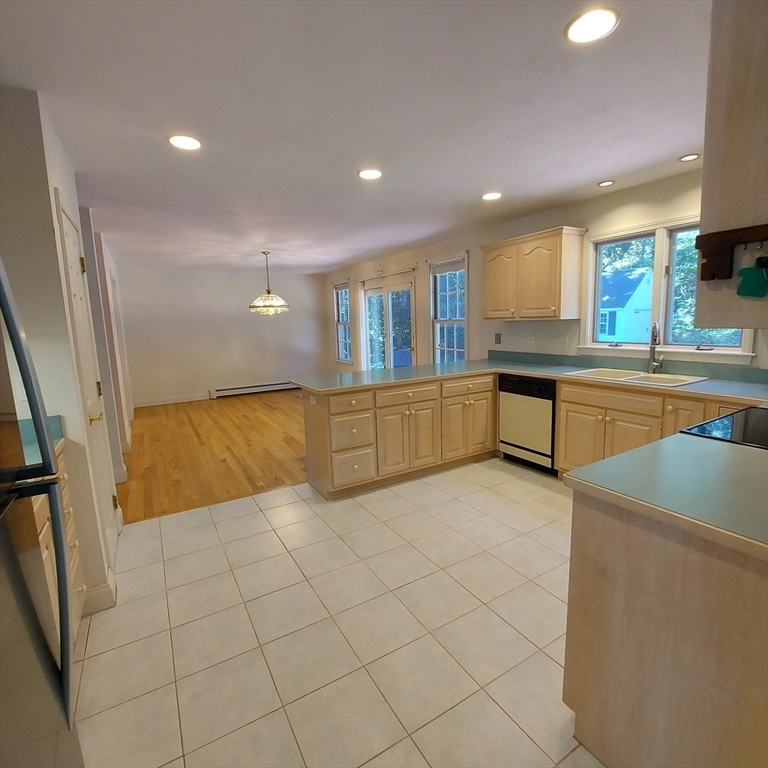 43 Barque Circle Dennis, MA 02660 - Photo 12 of 42 a kitchen with granite countertop a sink and cabinets