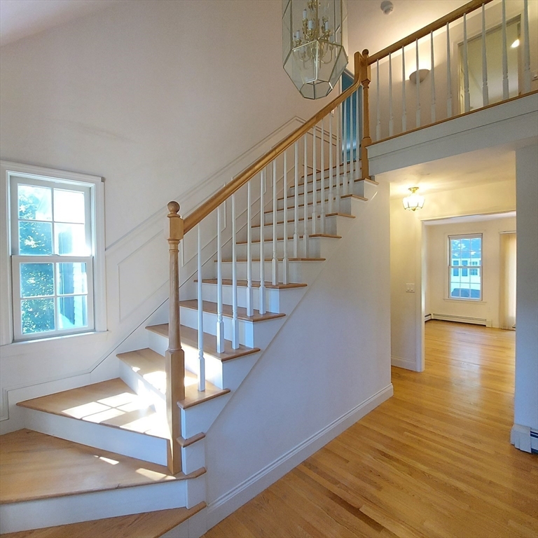 43 Barque Circle Dennis, MA 02660 - Photo 18 of 42 a view of entryway and hall with wooden floor