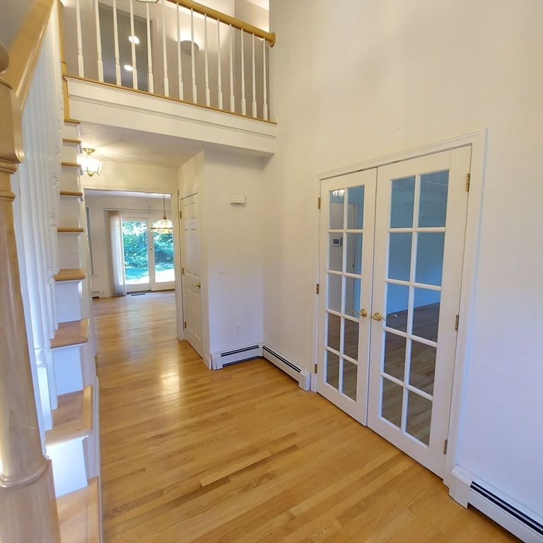 43 Barque Circle Dennis, MA 02660 - Photo 19 of 42 a view of an empty room with wooden floor and a window