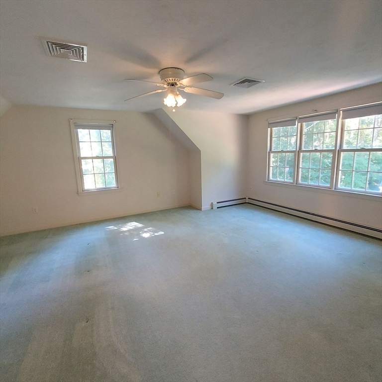 43 Barque Circle Dennis, MA 02660 - Photo 25 of 42 an empty room with a empty space and windows