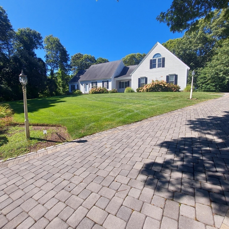 43 Barque Circle Dennis, MA 02660 - Photo 3 of 42 a view of a house with backyard and trees