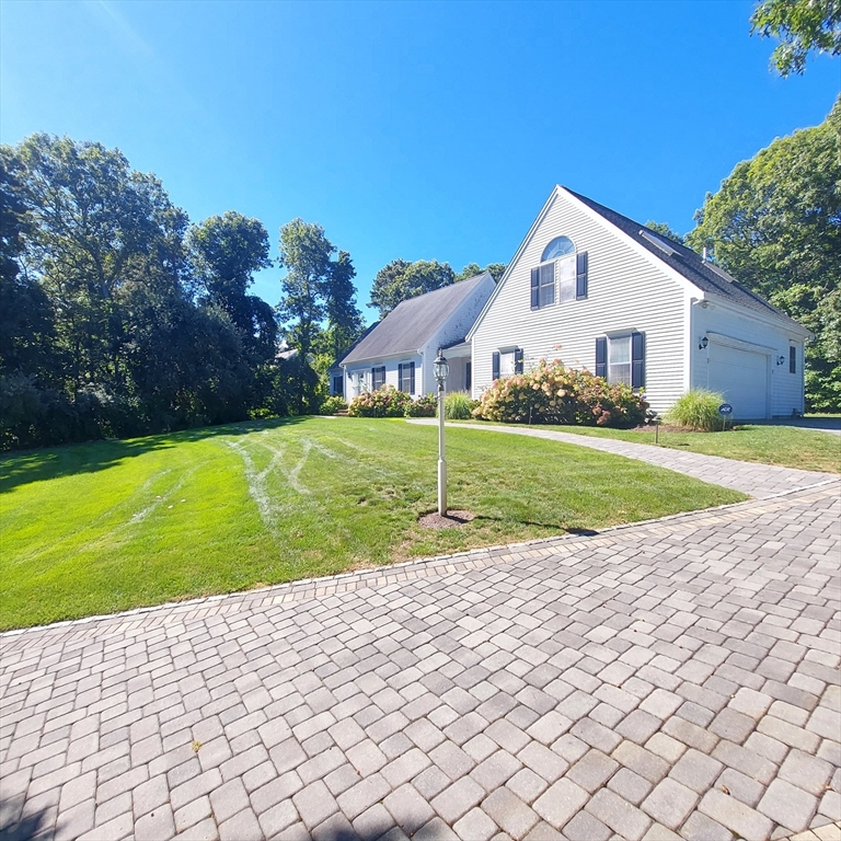43 Barque Circle Dennis, MA 02660 - Photo 4 of 42 a view of a house with a yard
