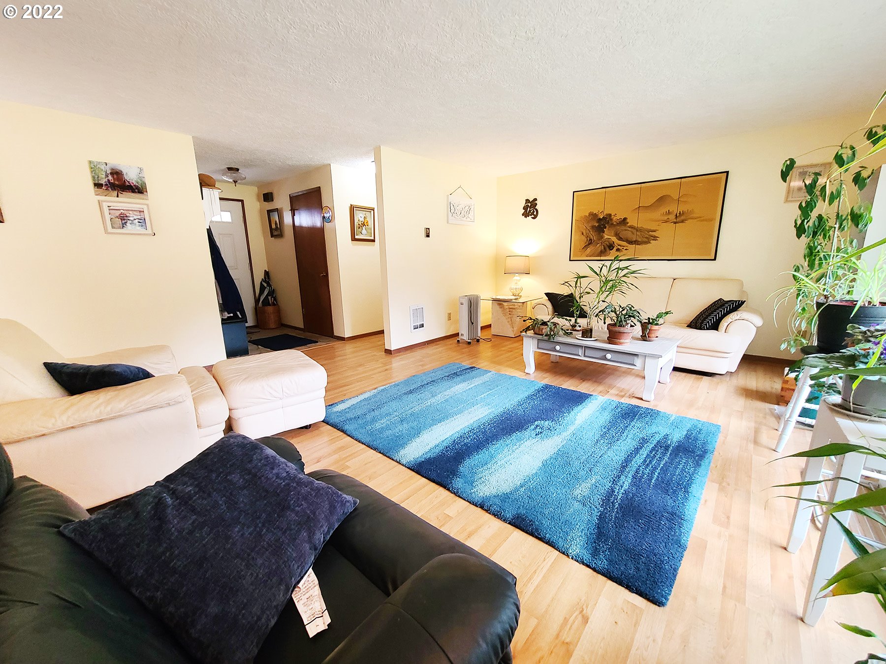 160 Roberson Road Woodland, WA 98674 - Photo 15 of 25 a living room with furniture and a flat screen tv