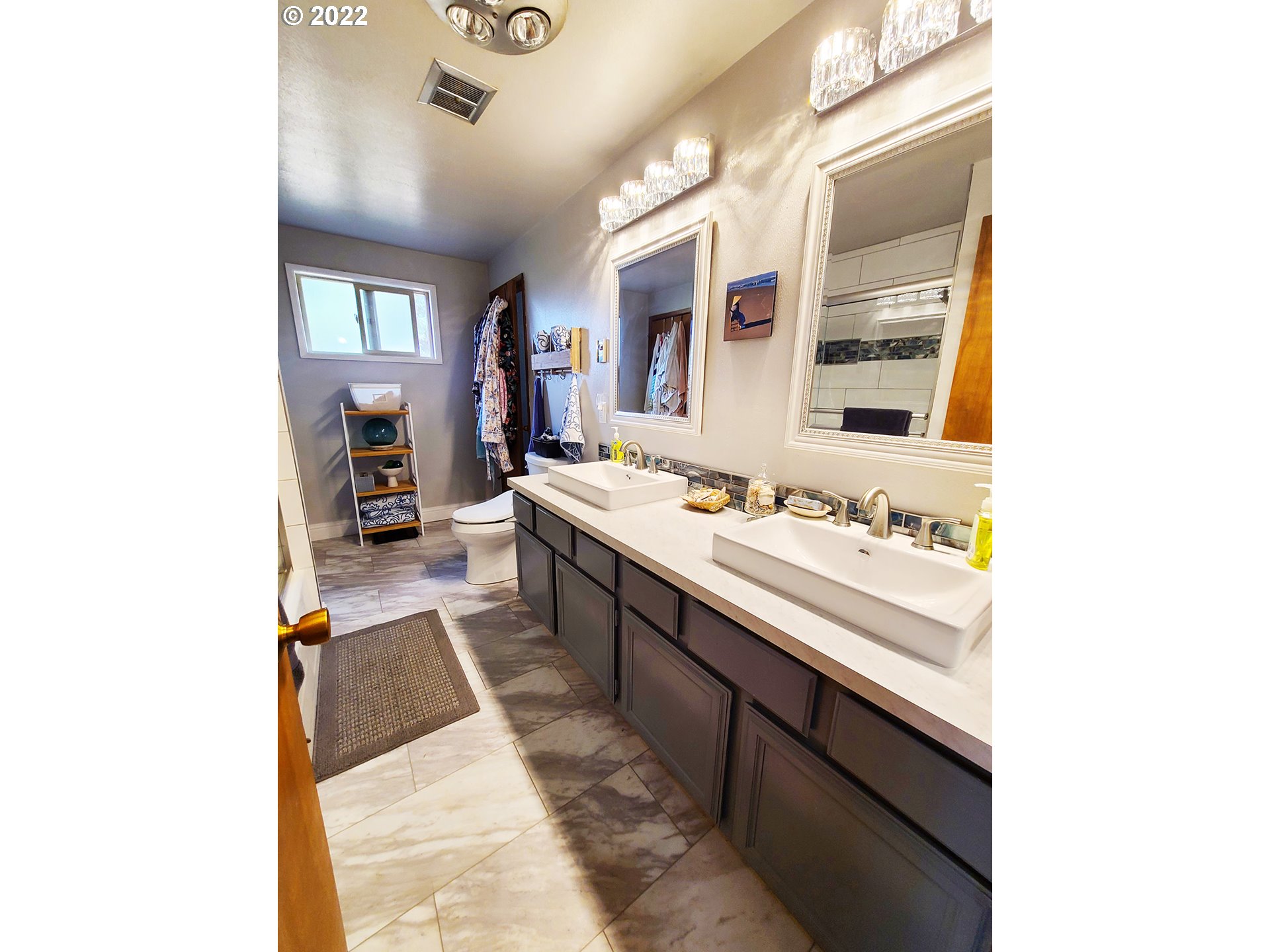 160 Roberson Road Woodland, WA 98674 - Photo 18 of 25 a spacious bathroom with a sink double vanity and a mirror