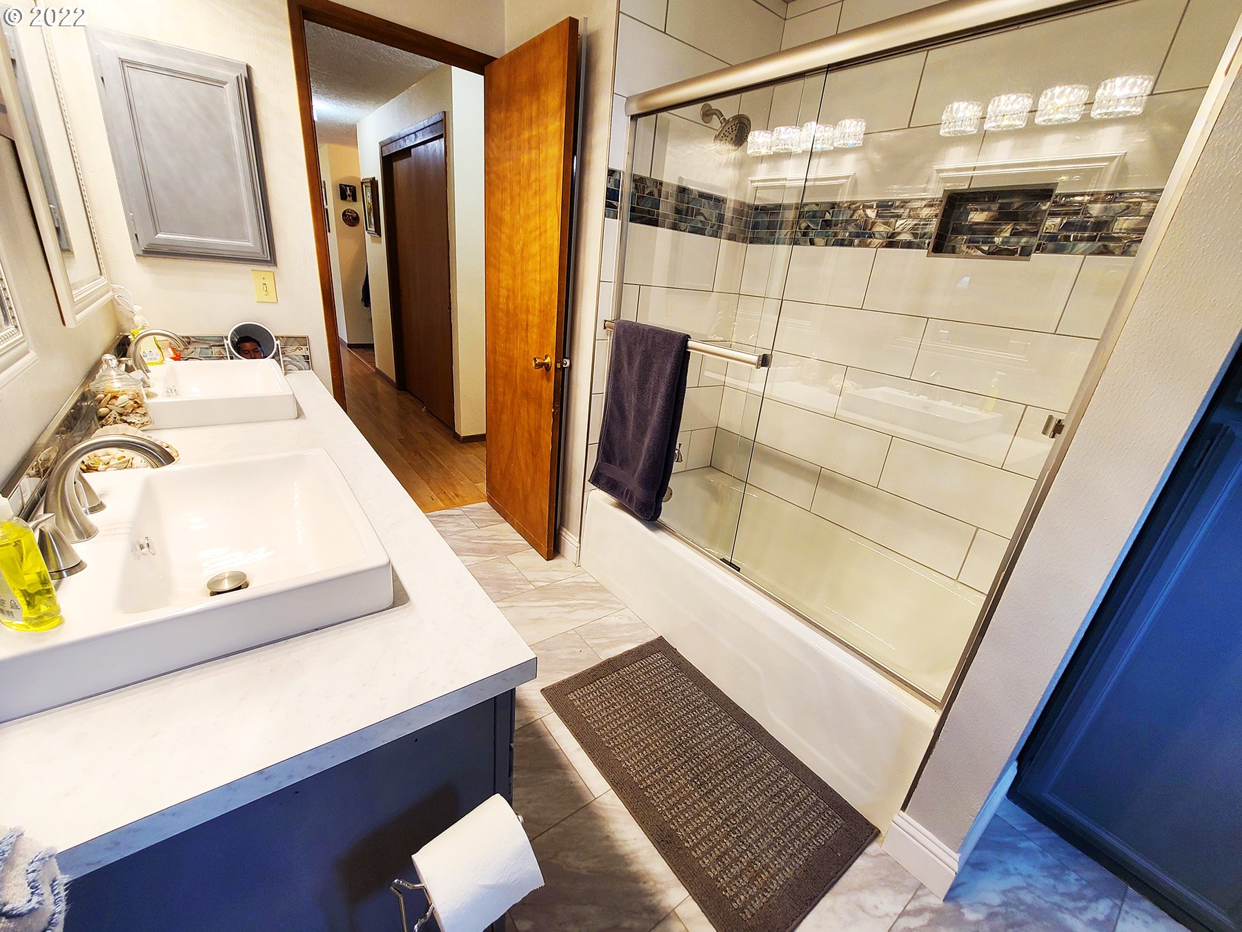 160 Roberson Road Woodland, WA 98674 - Photo 19 of 25 a bathroom with a sink and a mirror