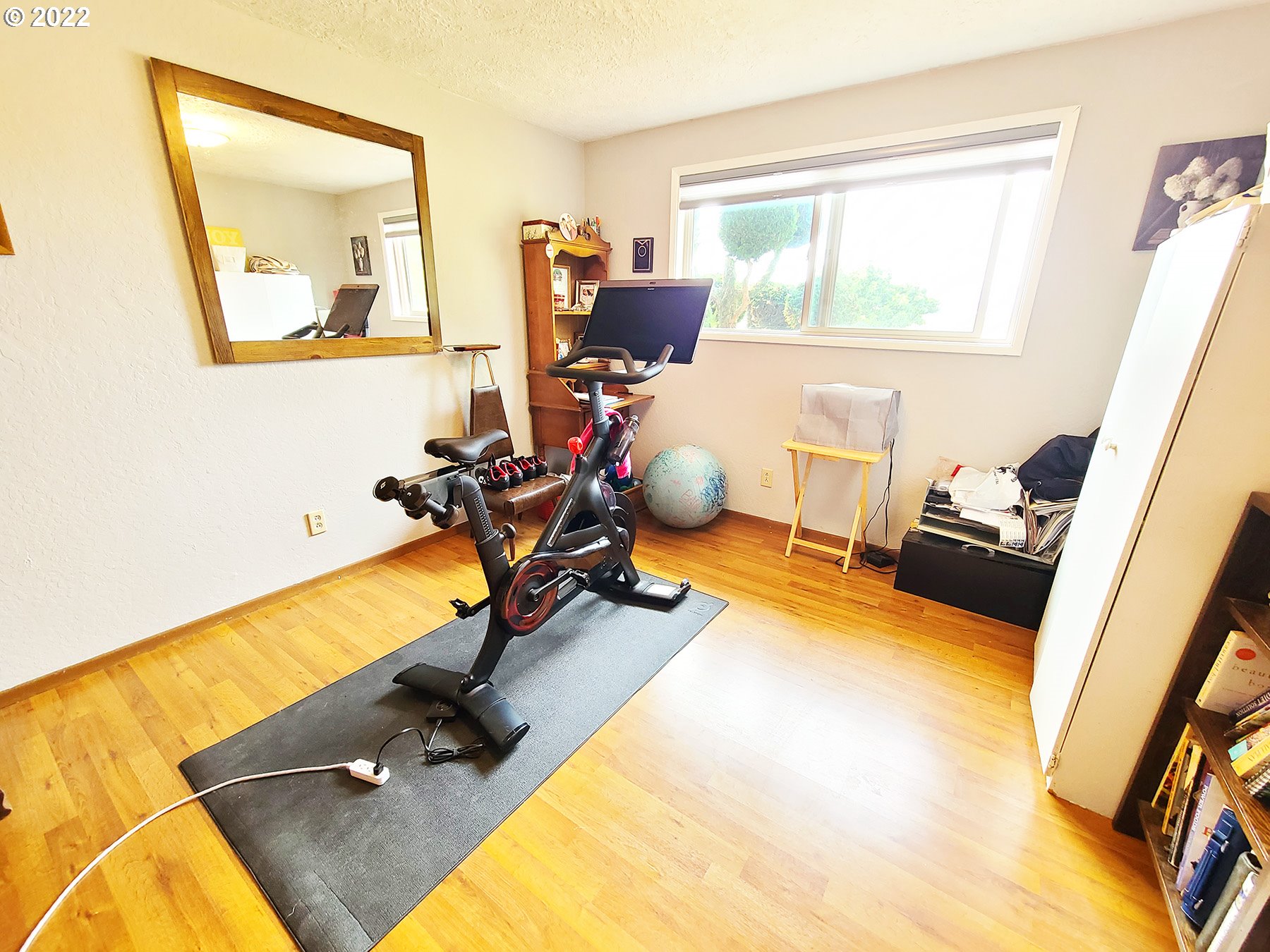 160 Roberson Road Woodland, WA 98674 - Photo 21 of 25 a room with wooden floor and furniture