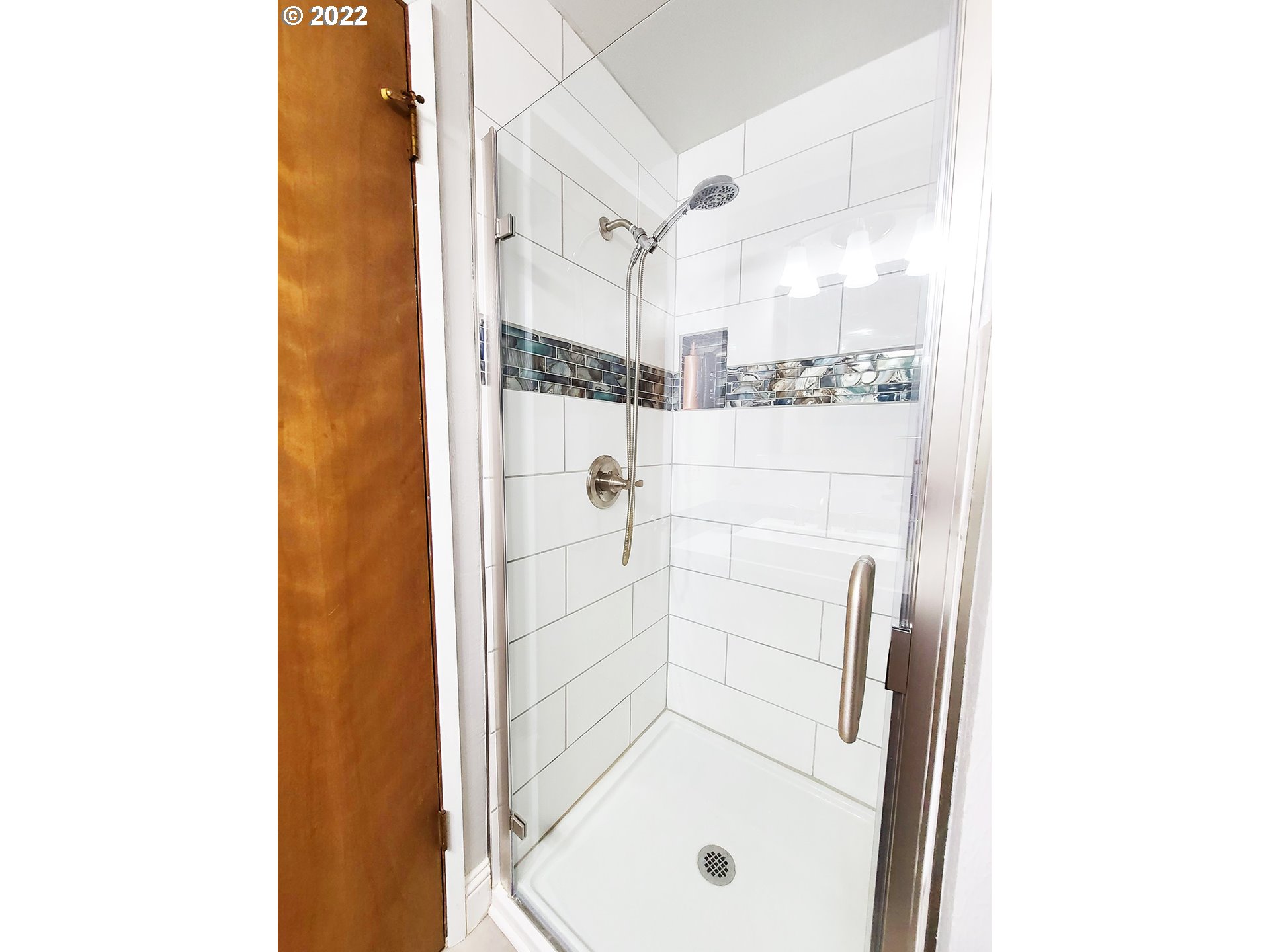 160 Roberson Road Woodland, WA 98674 - Photo 25 of 25 a bathroom with a glass shower door