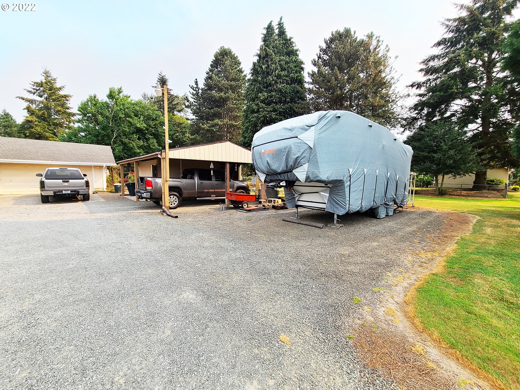 160 Roberson Road Woodland, WA 98674 - Photo 5 of 25 a view of a cars parked in front of a house