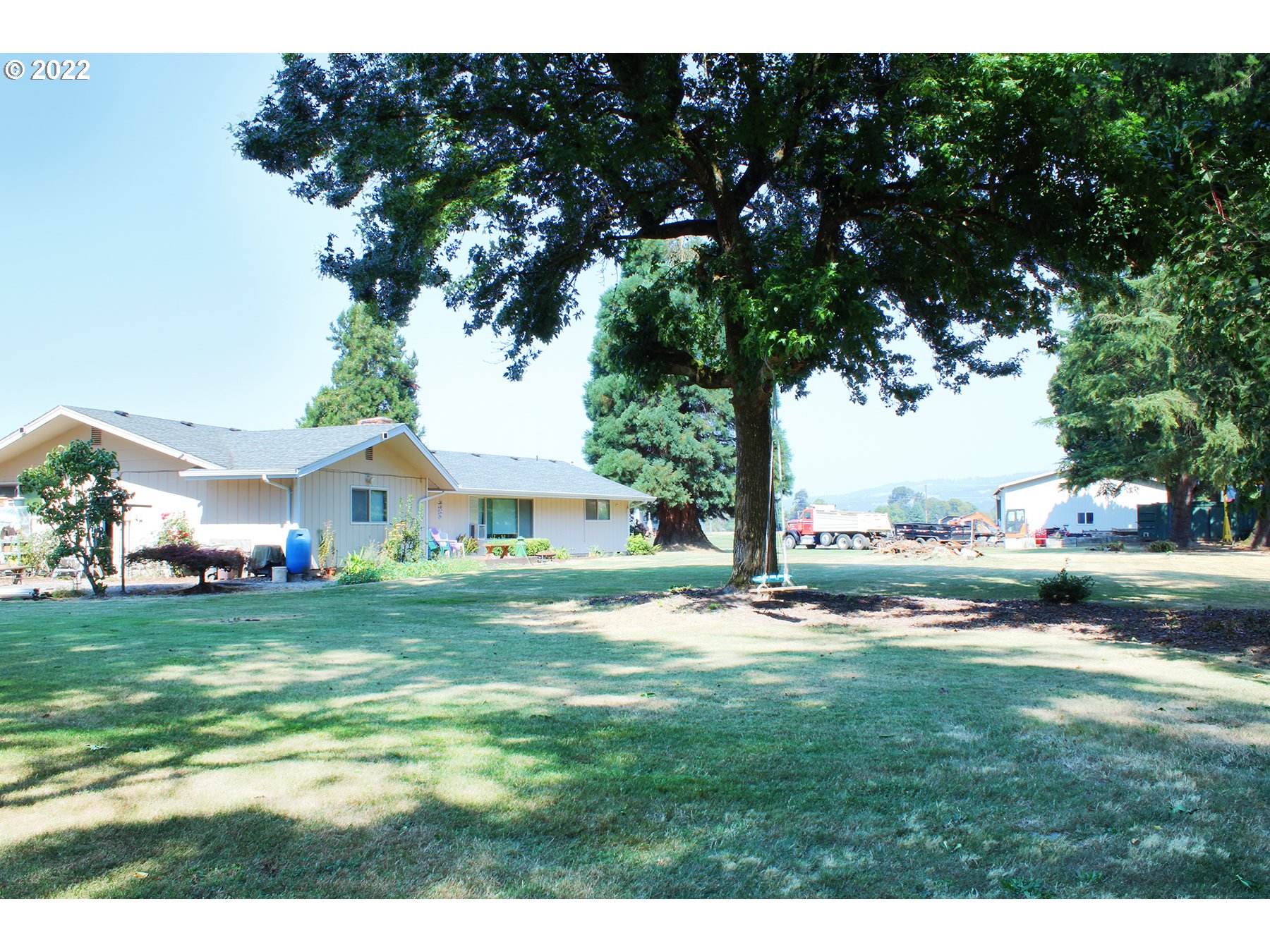 160 Roberson Road Woodland, WA 98674 - Photo 6 of 25 a view of a big yard with a house