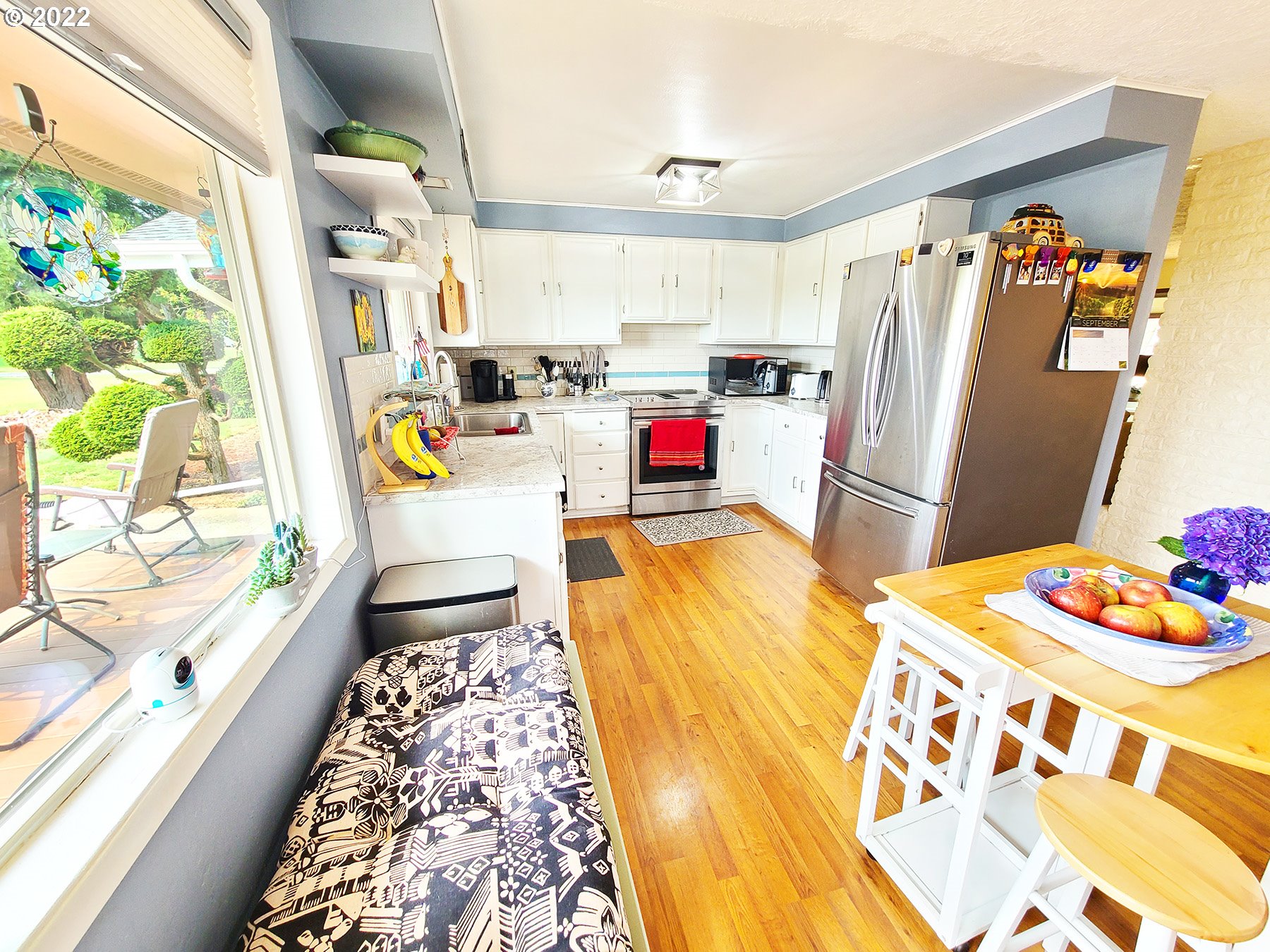 160 Roberson Road Woodland, WA 98674 - Photo 8 of 25 a kitchen with stainless steel appliances kitchen island granite countertop a refrigerator and a stove