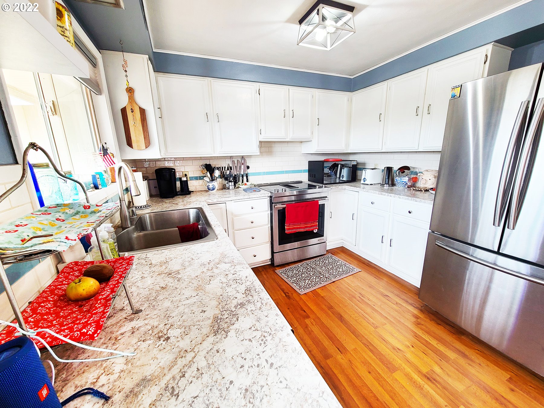 160 Roberson Road Woodland, WA 98674 - Photo 9 of 25 a kitchen with stainless steel appliances granite countertop a refrigerator sink and stove