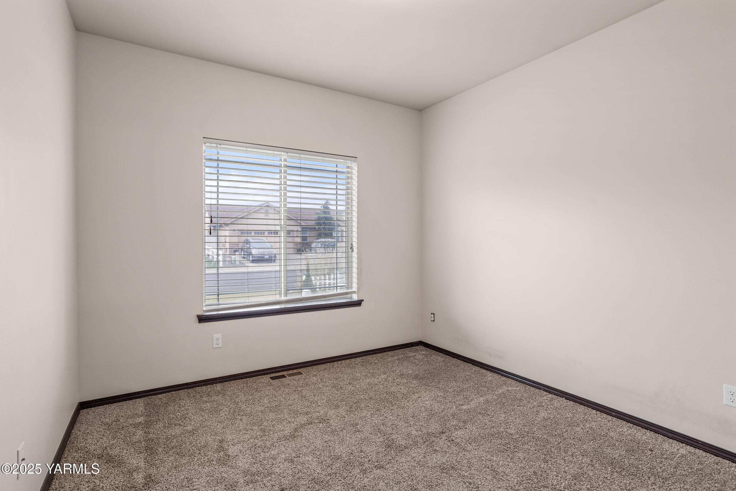 2017 South 59th Avenue Yakima, WA 98903 - Photo 23 of 32 an empty room with a window