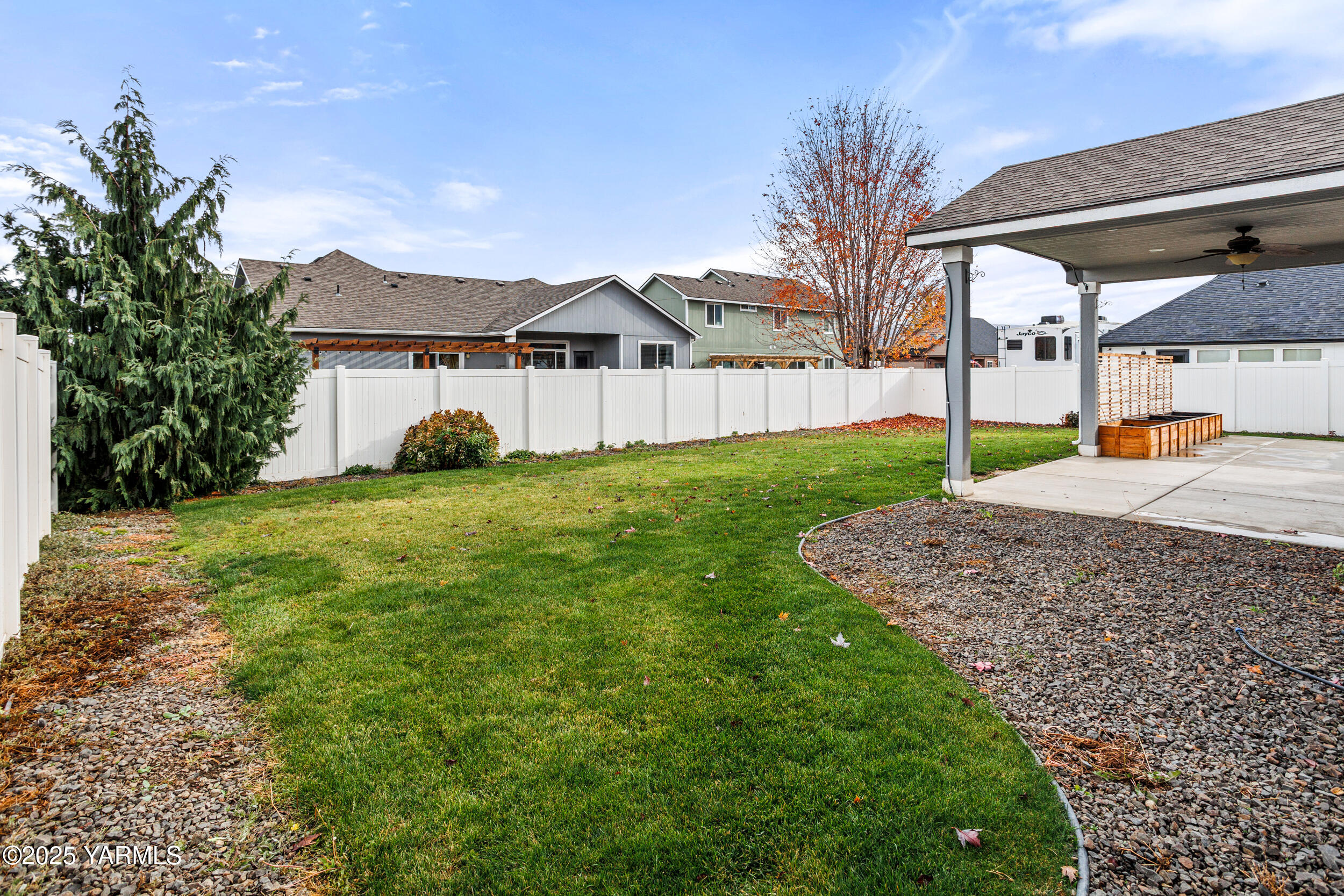 2017 South 59th Avenue Yakima, WA 98903 - Photo 31 of 32 a view of a house with a back yard