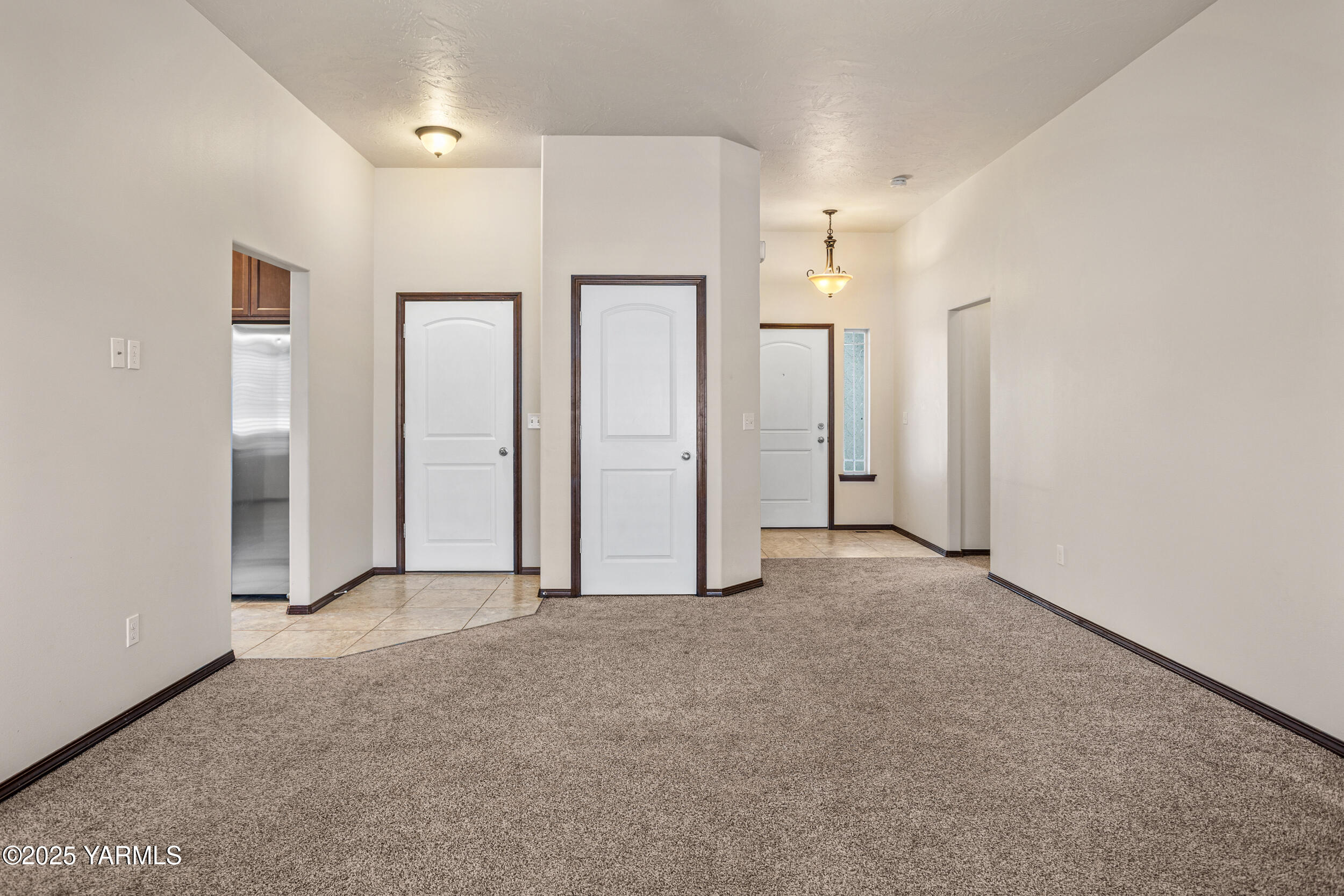 2017 South 59th Avenue Yakima, WA 98903 - Photo 6 of 32 an empty room with closet and mirror