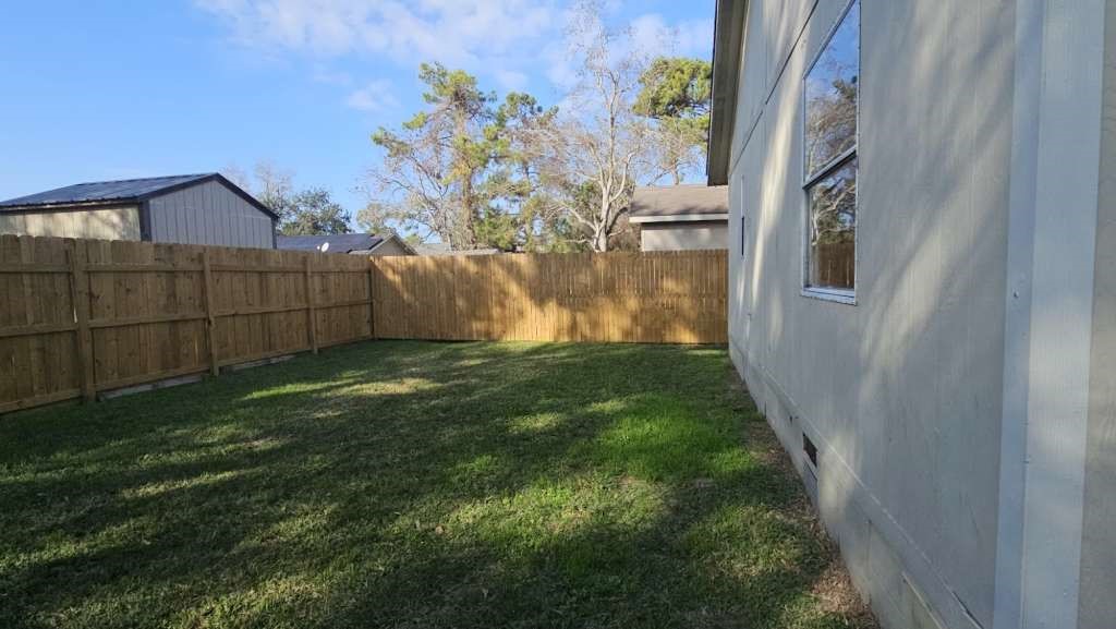 11919 Kingslake Forest Drive Houston, TX 77044 - Photo 12 of 12 a view of back yard of the house