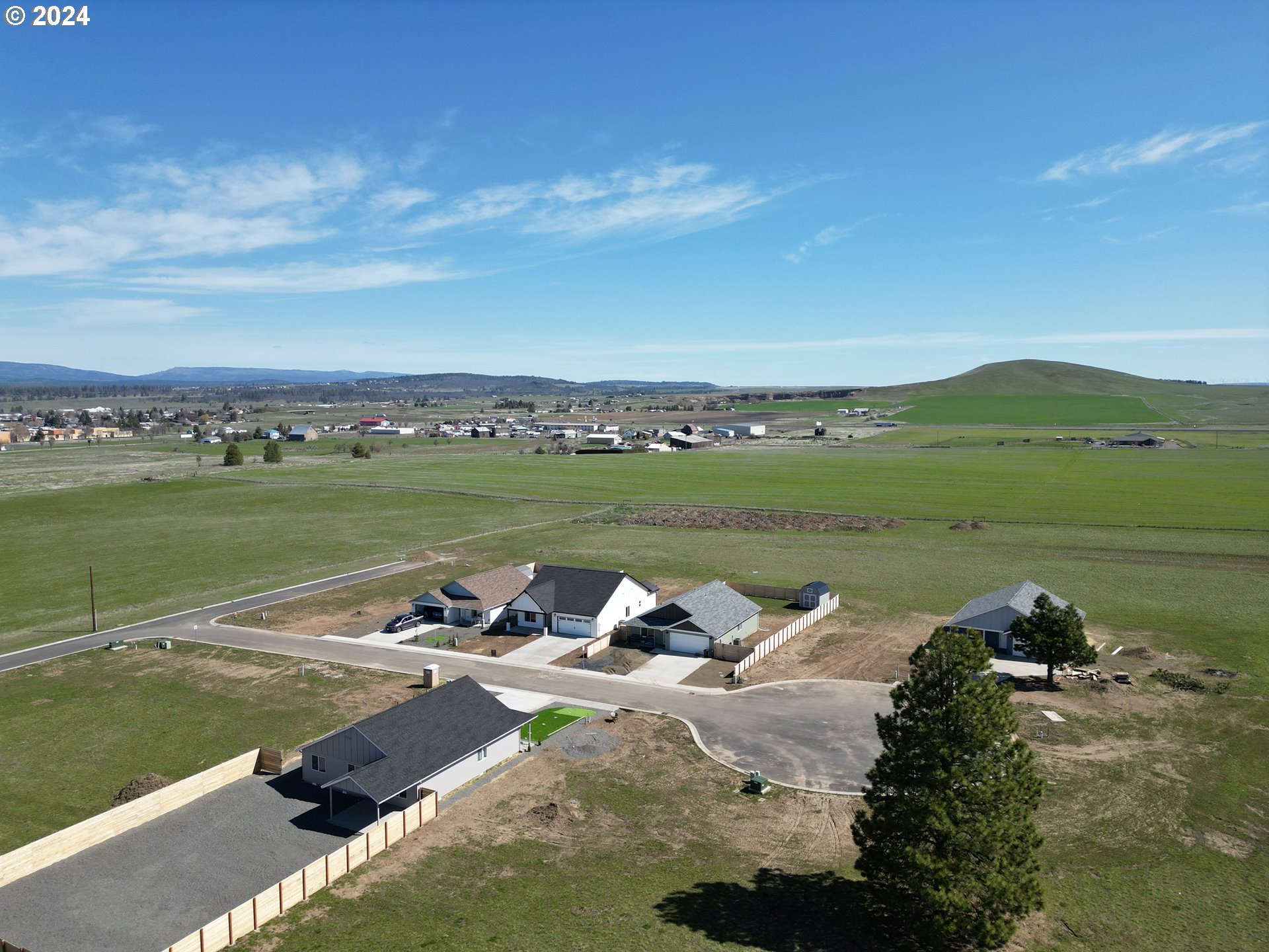 Highland Court Goldendale, WA 98620 - Photo 4 of 22 a view of a lake with a mountain