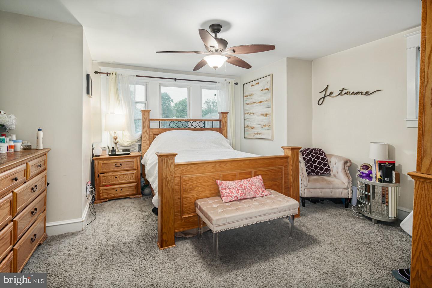 4932 State Road Drexel Hill, PA 19026 - Photo 14 of 27 a bedroom with a bed and a chandelier