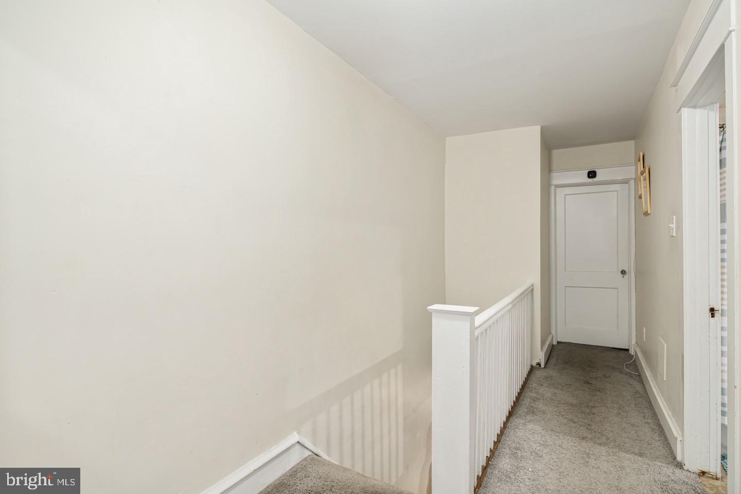 4932 State Road Drexel Hill, PA 19026 - Photo 22 of 27 a view of a hallway with white walls