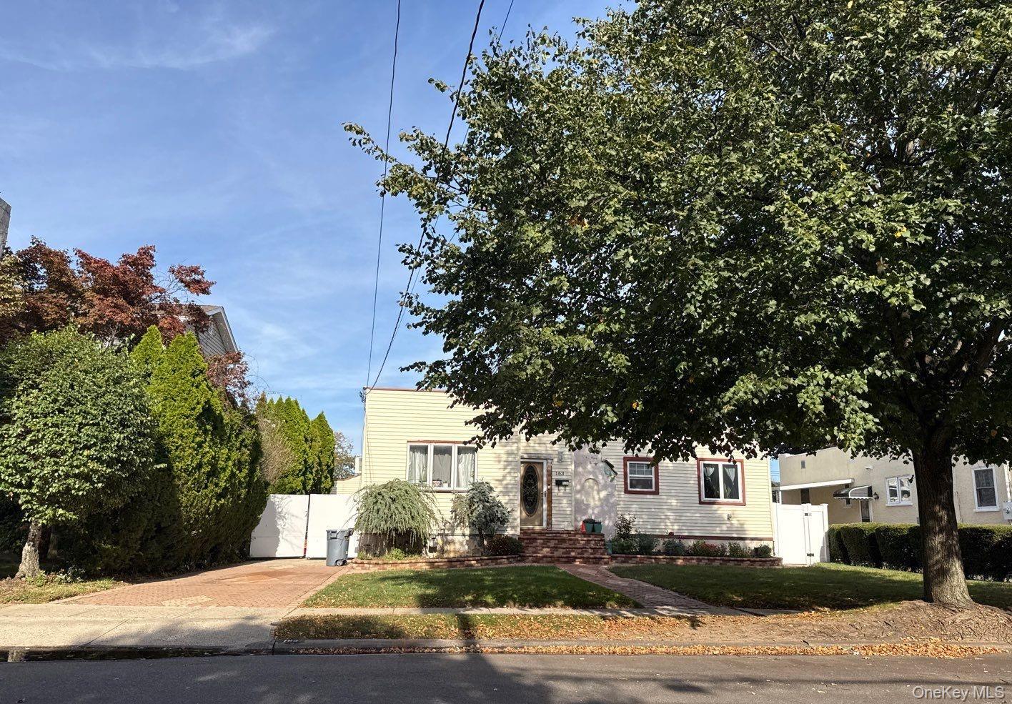 a view of a street with houses