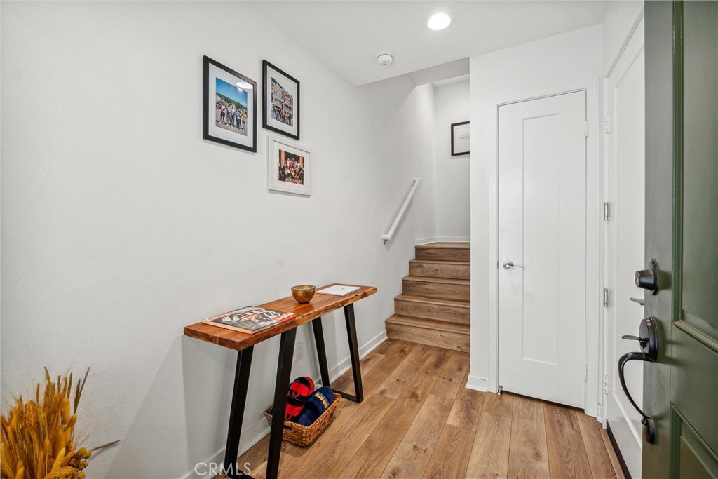 318 Ford Road Costa Mesa, CA 92627 - Photo 3 of 20 a view of entryway with wooden floor