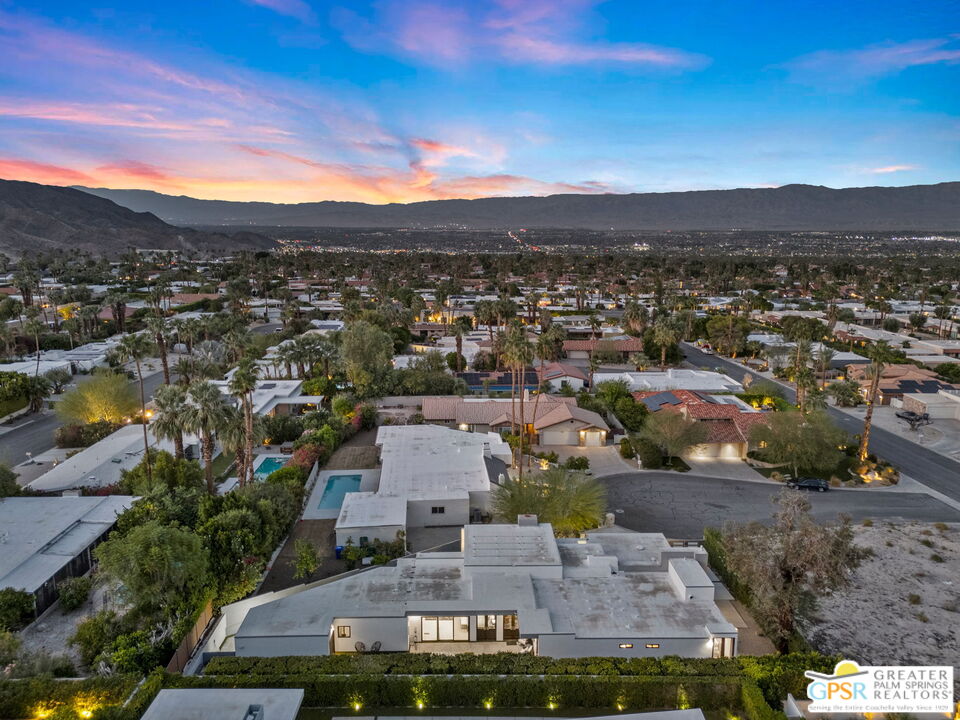 48365 Alan Circle Palm Desert, CA 92260 - Photo 17 of 75 an aerial view of residential houses with outdoor space and trees
