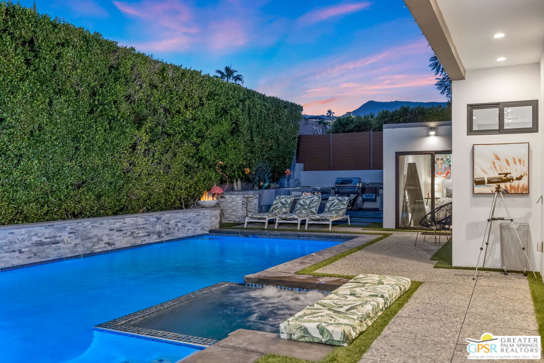 48365 Alan Circle Palm Desert, CA 92260 - Photo 24 of 75 a view of swimming pool with outdoor seating and plants