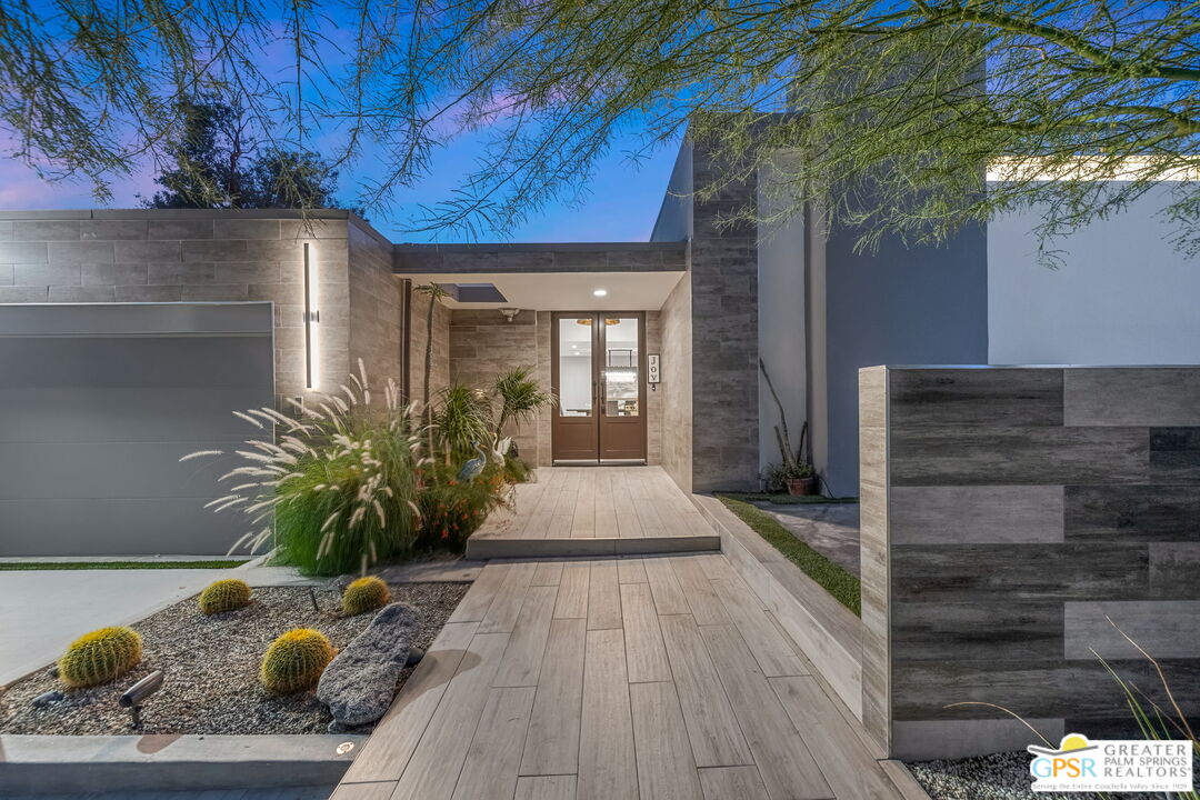 48365 Alan Circle Palm Desert, CA 92260 - Photo 25 of 75 a view of a entryway door front of house