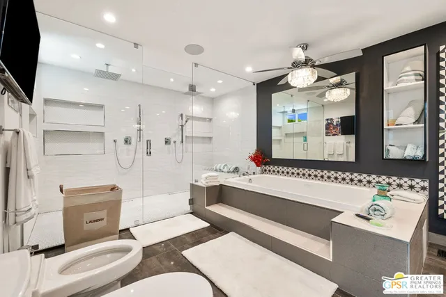 a kitchen with granite countertop a sink a counter top space and living room view