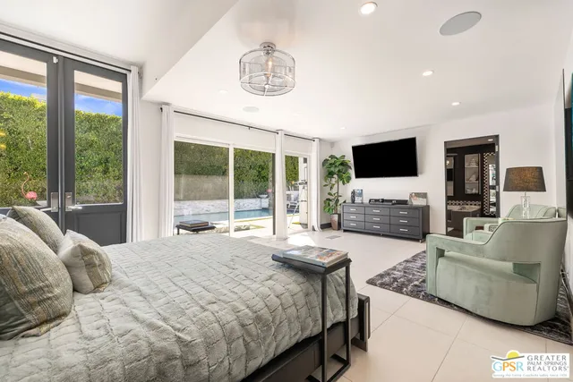 a kitchen with stainless steel appliances a stove sink and cabinets