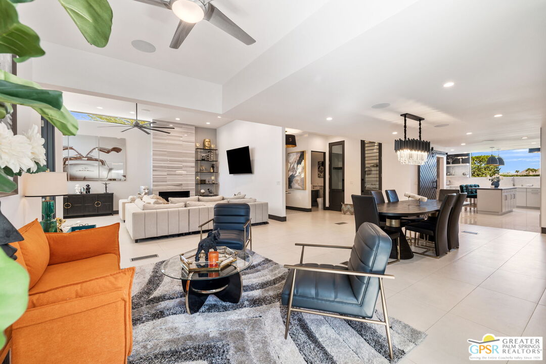 48365 Alan Circle Palm Desert, CA 92260 - Photo 38 of 75 a living room with furniture and kitchen view