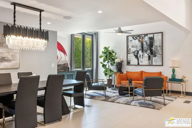 a bed room with a bed and a chair