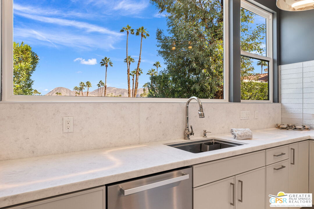 48365 Alan Circle Palm Desert, CA 92260 - Photo 46 of 75 a kitchen with a sink and a window