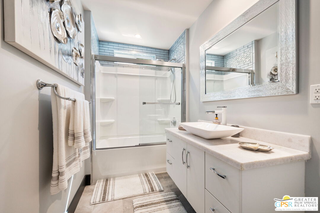 48365 Alan Circle Palm Desert, CA 92260 - Photo 55 of 75 a bathroom with a sink and a mirror